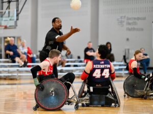 tip off in wheelchair rugby - referee throwing the ball to two players to compete. USA v GB